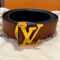 Authentic. In Good Condition. Only Defect Is The Scratch On The Lv. Leather On Actual Belt Is In New Condition. Only Wore Two Times. It’s Reversible With Brown And Black. Has Tag, Dust Bag, And Box. Possibly Still Have Lv Bag As Well. Still Have Receipts Lv Daily Multi Pocket Belt, Louise Vuitton Belt, She's Gotta Have It, Louis Vuitton Belt, Louis Vuitton Accessories, Reversible Belt, Brown Leather Belt, Louis Vuitton Shoulder Bag, Lv Bag