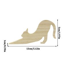 a wooden cutout of a cat laying on its side with measurements for the length