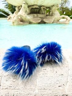 Keep it beachy with our Frosty Blue Fur Slides! These slides will give you that pop of color you need to complete your summer outfit. All of our slides feature full, fluffy fur--the way they were meant to be! Wear them by the pool on your next vacay or out on a lunch date. These slides run true to size, so order your regular size. *Made of sustainable fox and raccoon fur. No animals are harmed. *Extra large, fluffy fur *These slides run true to size--if you wear a half size, order a size up. *Pr Fox And Raccoon, Fuzzy Slides, Slippers Womens, Lunch Date, Sandals Slippers, Slides Sandals, Blue Sandals, Fur Slides, Pool Slides