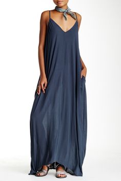 Whether you are hanging out at the pool or beach, this relaxed fitting gauze maxi dress is light enough to keep you cool on the warmest day.Fit: this style runs large, order one size down. V-neck. Adjustable spaghetti straps. V-back. 2 side seam pockets. Solid color. Crinkled woven construction. Approx. 58" length (size S-M). Imported Gauze Maxi Dress, Max Dress, Spaghetti Strap Maxi Dress, Love Stitch, How To Hem Pants, April 27, Dark Teal, Dress Cuts, Flowing Maxi Dress