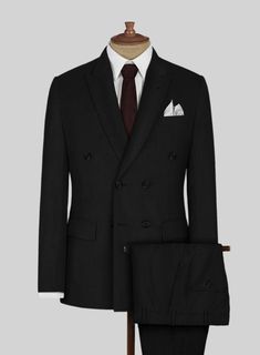 Make a move towards greater freedom, comfort and versatility in our Napolean Black Wool Suit that will also prove to be a stylish choice in your tailoring repertoire. Crafted from wool blend, the wool suit has the right balance of classic and boundary-push. Combine it with a crisp white shirt, plain gray tie and polished black dress shoes.  Look Includes   Napolean Black Wool Fabric  Double Breasted Jacket Style  Peak Lapel   Horn Royal   Black  Buttons  Single Vent  Three Cuff Buttons  Two Welt Double Breasted Business Suit With Concealed Placket, Business Double-breasted Suit With Concealed Placket, Double-breasted Wool Tuxedo For Work, Tailored Black Wool Three-piece Suit, Wool Double-breasted Tuxedo Suit, Double-breasted Three-piece Suit For Business, Semi-formal Double-breasted Suit With Concealed Placket, Double Breasted Suit With Welt Pockets And Suit Collar, Double Breasted Suit With Welt Pockets And Suiting Fabric