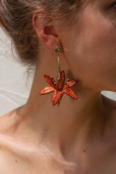 "\"Lilium are a genus of flowering plants which are important in culture and literature in much of the world. In the Victorian language of flowers, lilies portray love, ardor, and affection for your loved ones, while orange lilies stand for happiness, love, and warmth.\" - Wikipedia These light weight statement earrings are composed of hand dyed thick and rare luxurious vintage lace. Hand sewn into 6 petal flowers, they are shaped into 3 dimensional lilies with stamens of raw brass and coconut b Lily Flower Earrings, Orange Statement Earrings, Floral Statement Earrings, Unique Statement Earrings, Orange Flower Earrings, Laces Aesthetic, Victorian Language, Orange Lilies, Lily Earrings