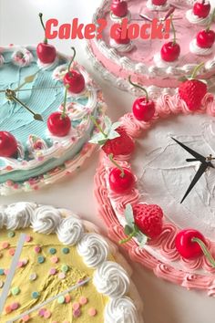 four cakes decorated with cherries and sprinkles