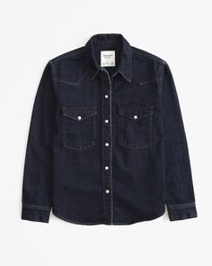 On-trend shirt in a soft denim fabric and relaxed-fit silhouette, with classic collar, chest pockets with snap closure, snap-up front and curved hem. Western Denim Shirt, Womens Denim Shirt, Suits Coats, Athletic Fits, Dark Denim, Shirt Women, Denim Fabric, Trending Shirts, Women's Tops