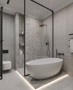 a large white bathtub sitting in the middle of a bathroom