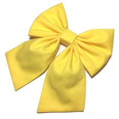 "This yellow hair bow will go perfectly with your school uniform, your cheerleader or dance outfit, or whatever occasion you want stand out of a crowd. It can also be used to complement a cosplay costume, not just as a hair bow, but as a bow attached to complete the look on your costume This hair bow is handmade on solid cotton fabric. For your convenience, I offer different hair clips so you can choose the one that meet your needs. You can also choose to NOT have a hair clip attached to the bow Cute Everyday Outfits For School, Large Hair Bow, Large Hair Bows, Dance Outfit, Handmade Hair Bows, Cheer Bow