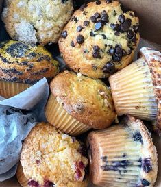 a box filled with muffins covered in chocolate chips