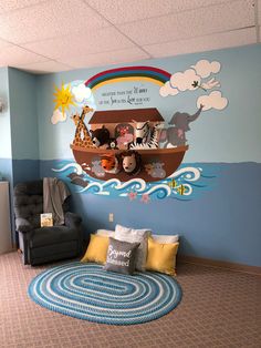 the children's room has a noah theme on the wall