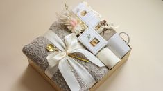 the gift box is filled with items for someone's special occasion