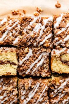 several pieces of cake with white icing on top