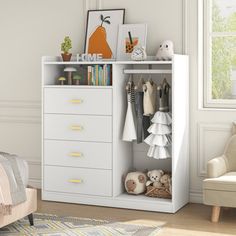 a room with a bed, chair and white dresser in the corner next to a window