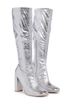 you’re all charged up. These boots have a shiny metallic construction, side zipper closure, round toes, and block heels. Silver High Boots, Silver Knee High Boots, Chrome Boots, Tin Man Costumes, Shiny Boots, Vis Dev, Dolls Kill Shoes, Silver Boots, 70s Party