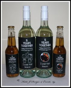 three bottles of wine with labels on them