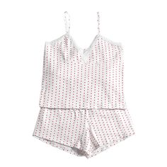 a women's white and red polka dot tankini set