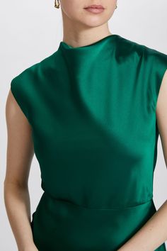 Fluid Satin high cowl neck A-line Dress. Shown in Emerald. It is possible to have this style Made to Order in any of our standard Fluid Satin colors, please reach out to customerservice@amsale.com to place an order. Joseph Magnin, Satin Cowl Neck Dress, Green Sleeveless Dress, Amsale Dress, Dark Stain, 1960s Mod, Cowl Neck Dress, Satin Color, A Line Gown