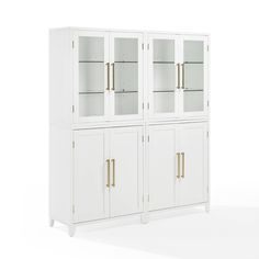 a white cabinet with glass doors and gold handles