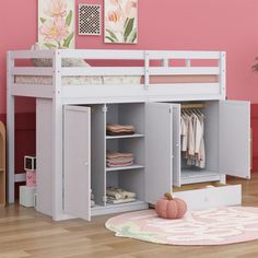 a white bunk bed sitting next to a pink wall in a room with hardwood floors