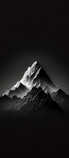 a black and white photo of a mountain