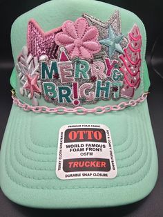 Pastel theme Merry & Bright pink themed hat, Super sparkly on seafoam and even has a pink Little Debbie Christmas tree on the side... so cute!  Hat comes complete with a matching pink hat chain. Little Debbie Tree, Little Debbie Christmas Tree, Hat Chain, Little Debbie, Pastel Theme, Pink Hat, Sea Foam, Merry And Bright, Last Minute Gifts