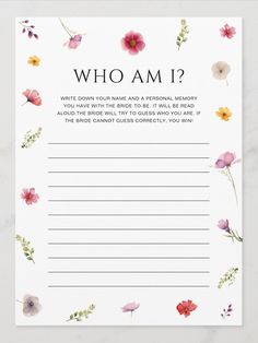 a card with the words who am? written on it and colorful flowers around it