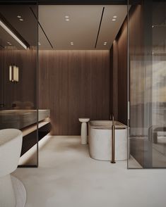 a bathroom with a tub, sink and toilet in it's center wall is shown