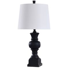 a black table lamp with a white shade on the top and bottom part of it