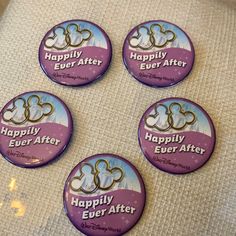 four buttons that say happily ever after