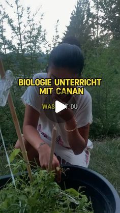 a woman kneeling down in front of a potted plant with the words biologie untericht mit cann