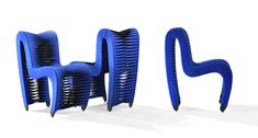 two blue chairs sitting next to each other