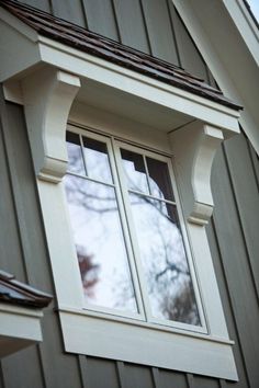 an image of a window in the side of a house