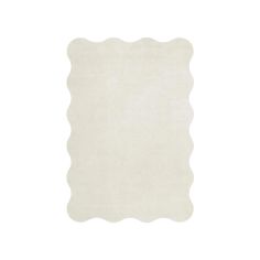 a white rug with scalloped edges on the bottom, and a square shape in the middle