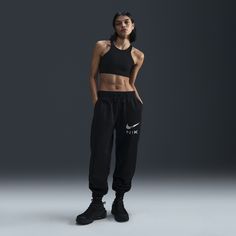 Midweight brushed fleece and an oversized fit work together to help you say cozy in these sweats. Sportswear Sweats With Elastic Waistband For Workout, Nike Cotton Joggers For Workout, Nike Fleece Joggers In Athleisure Style, Nike Sportswear Joggers For Gym, Nike Athleisure Sweatpants For Workout, Nike Athleisure Bottoms With Ribbed Waistband, Nike Bottoms With Ribbed Waistband For Athleisure, Sporty Fleece Sweatpants For Workout, Athleisure Fleece Sports Pants