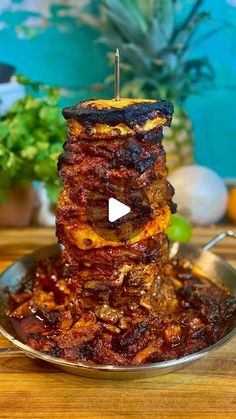 a stack of food sitting on top of a metal pan