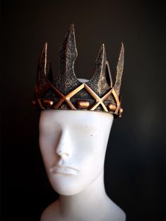 medieval crown in quality foam type base that's lightweight but strong and custom painted to any color or select in bronze C U S T O M I Z A T I O N Can be customized further. Get in touch for custom orders! S I Z E  Adult size only. S H I P P I N G -  Processed same day or within 24 hours.  1-2 day guaranteed delivery, add item to cart, click shipping tab for rates.  Pls leave a check out note with your need date & contact number  Msg for delivery time frames (Include your state/country) C O N T A C T  Please contact us via ETSY messages. P H O T O  Images displayed on this listing are property of www.higginscreek.com A B O U T HigginsCreek makes elegant and fun photography props for adults and children for all special occasions.   Thank you in advance for your order and support! Medieval King, Cosplay Crown, Medieval Crown, Regal Elegance, Crown Gold, Costume Parties, Themed Events, Masquerade Mask, Black Mask