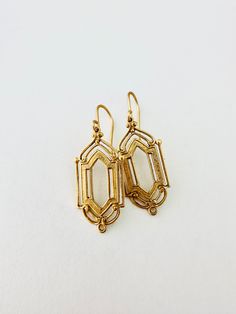 Raw brass art deco earrings.  Gold tone ear wires. 1 1/2 inches long with ear wires.  Thanks for stopping by! Enter my shop here to see more unique and whimsical designs: https://www.etsy.com/shop/CircaAD Original creation of Circa A.D. Studio © 2023 Circa A.D. Studio All rights reserved Antique Brass Chandelier Earrings As Gift, Gold Art Deco Jewelry For Pierced Ears, Art Deco Gold Drop Earrings, Art Deco Drop Earrings For Gift, Art Deco Dangle Earrings, Antique Brass Chandelier Earrings For Gift, Art Deco Gold Brass Jewelry, Unique Gold Earrings With Lever Back Ear Wires, Art Deco Pierced Drop Earrings