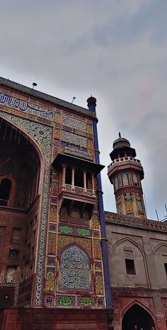 an ornate building with two tall towers