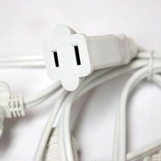 two white electrical cords connected to each other