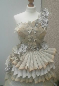 a dress made out of old book pages