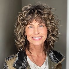 Shaggy Curly Hair Long Bangs, Curly Shag With Bangs Over 40, Curls With Fringe, Curly Gray Hair Over 50 Curls With Bangs, Shaggy Curly Hair Medium, Curly Hair With Fringe, Hair Cut For 50 Year Old Women Over 50 Curly, Curly Shag With Bangs, Tousled 70s Shag