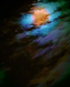 a blurry image of the sky and clouds is seen in this photo from space