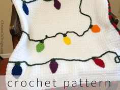 a crocheted blanket with christmas lights on it and the words, crochet pattern