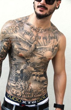 a man with lots of tattoos on his chest