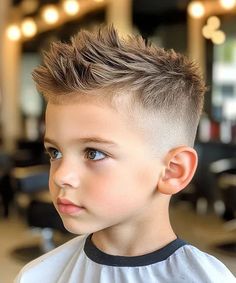 Stylish, Messy and Textured Short Hair with Mid Fade. This trendy short boy’s haircut is effortlessly stylish, versatile and school-appropriate, making it the perfect style to experiment with at your kid’s next barber appointment. A cool hairstyle for your little one will support your son’s confidence while allowing his look to reflect his personality. Save this cut and show the photo to his stylist to copy the look. Popular Boys Haircuts, Trendy Boys Haircuts, Boys Fade Haircut, Boys Haircut Styles, Mohawk Haircut, Boy Haircuts Short, Toddler Haircuts