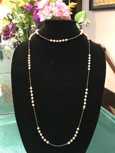 "This piece was designed to copy an actual necklace worn by Lady Mary in the PBS series Downton Abbey. This necklace is 50\" of glittering faceted gold natural iron pyrite beads interspersed with mint condition 6mm vintage cream faux Majorca pearls OR genuine AAA freshwater pearls (choose when you checkout). This is a VERY long necklace; it measures 50\" total from top to bottom. It can be worn as one long necklace (if you're tall or channeling your inner flapper) but it's also meant to be loope Downton Abbey Jewelry, Elegant Single Strand Chain Necklace For Formal Occasions, Formal Double Strand Pearl Chain Necklace, Formal Double Strand Long Necklace, Elegant Double Strand Long Necklace For Formal Occasions, Gold Single Strand Jewelry For Evening, Single Strand Gold Jewelry For Evening, Elegant Handmade Long Chain Necklace, Handmade Elegant Long Chain Necklace