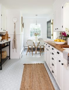 the kitchen is clean and ready to be used as a breakfast nook or dining room