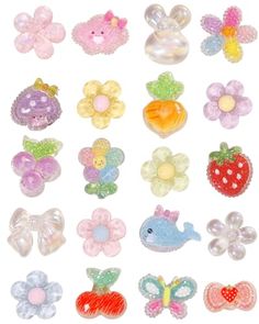 many different types of hair clips with flowers and butterflies on them, all in various colors