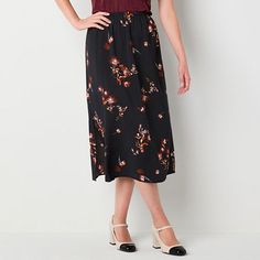 Whether dressed up with heels or styled casually with flats, this a.n.a women's a-line skirt is a chic and versatile piece for your wardrobe. It's crafted from a floral-print fabric with a flat front elastic gathered waist, a side slit and hits at the midi-length. Wear it with a blouse or tee. Front Style: Flat FrontClosure Type: Full ElasticRise: At WaistApparel Length: 31.75 InchesFiber Content: 84% Rayon, 16% NylonFabric Description: Plain WeaveLining: UnlinedSkirt Length: Midi LengthCare: Li Floral Print Fabric, Skirt Black, Print Fabric, A Line Skirt, A Line Skirts, Midi Length, A Line, Floral Print, Dress Up