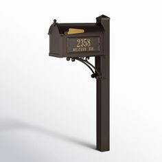 an old fashioned mailbox with the number 2058 on it