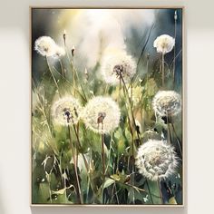 a painting of dandelions is hanging on the wall