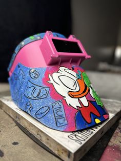 Welding mask, 100% customizable, Add names colors. Anything If you are interested in getting your very own welding mask, message me for custom work , Fully customizable and 1 of a kind, 100% leather , Isn't made with a press, it's handcrafted to insure the highest quality, and ensures personalization 🙌🏽 If you have a mask in mind and have yet to find one that describes your personality I am here to help you create your very own mask. Feel free to message me with your ideas The shield is FIBERMETAL price is per each This hood comes with HEAD and Construction hat mount Welding Hood Designs, Welding Helmet Designs, Welder Humor, Welding Hats, Welding Hoods, Construction Hat, Welding Mask, Describe Your Personality, Welding Helmet